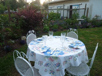 The table setting for dinner in Woodston Cottage garden (2012)